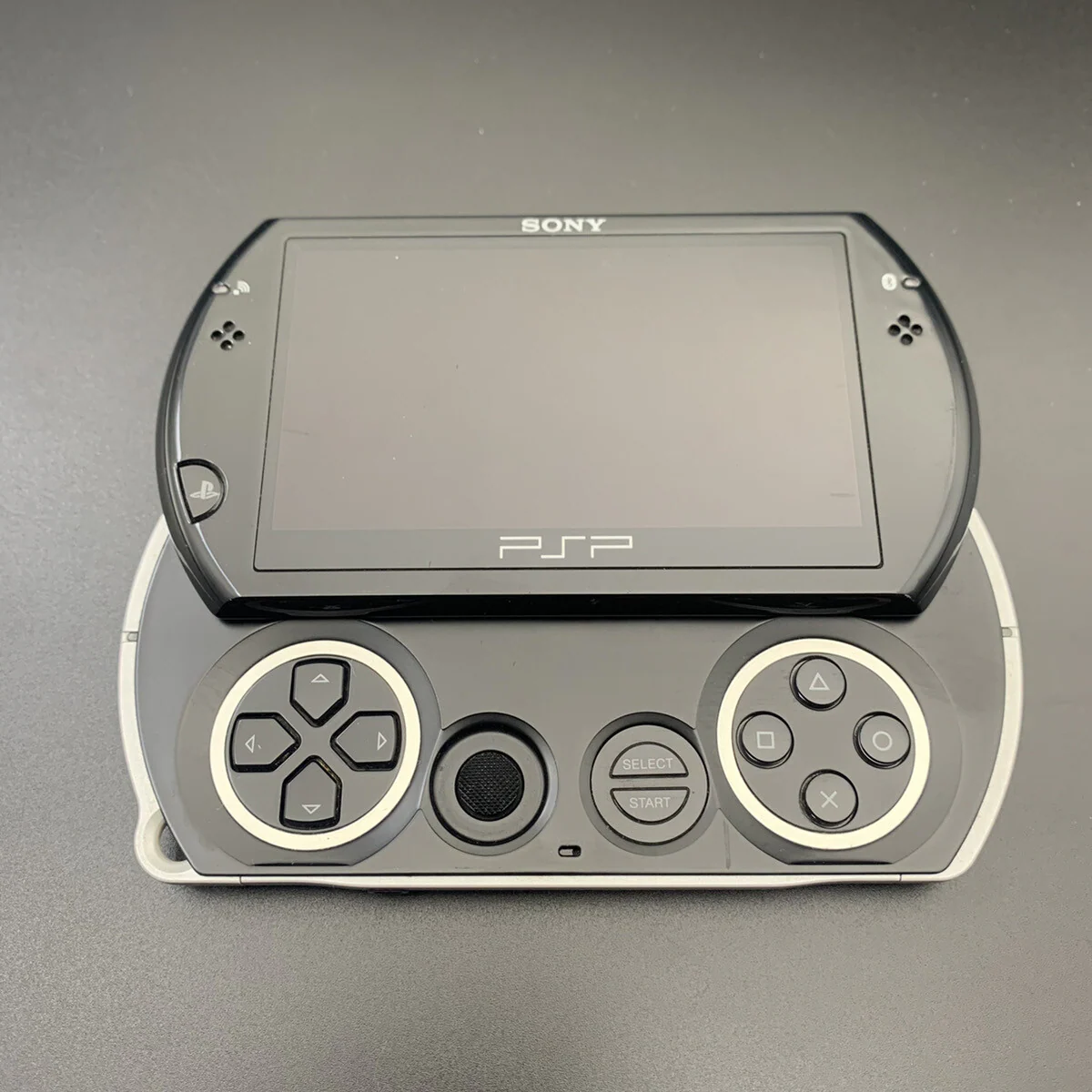 PSP - Konsole PSP GO #Piano Black / schwarz + Netzteil (mit OVP) (gebraucht)